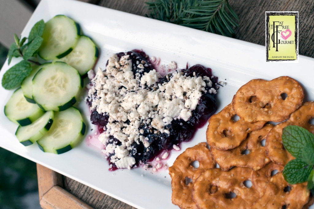 Fat-Free Cranberry Feta Caviar served with cucumber slices and pretzel chips